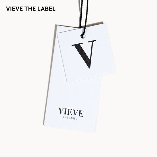 White tag with 'Vieve the Label' branding on a white background