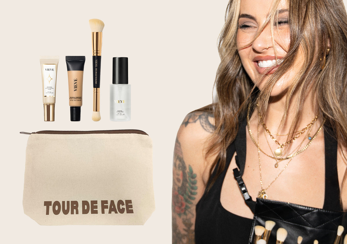Jamie's Tour Kit: Skin Nova Instant Radiance Primer, a Skin Nova complexion tube, the 301 Double-Ended Set & Sculpt Brush and a setting spray above a "Tour de Face" canvas makeup bag, beside VIEVE founder Jamie Genevieve wearing a makeup brush belt.