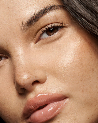 Woman with matte and radiant skin loading=